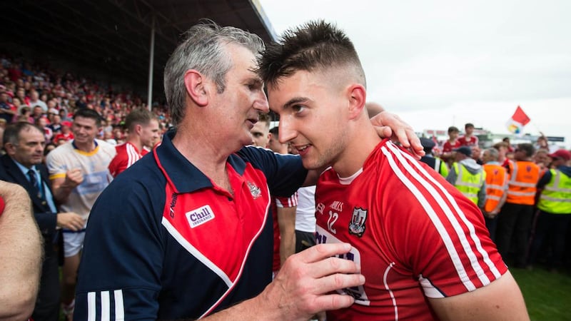 Cork manager Kieran Kingston celebrates with his son Shane after the 2017 Munster final win over Clare at Semple Stadium. Photograph: Cathal Noonan/Inpho