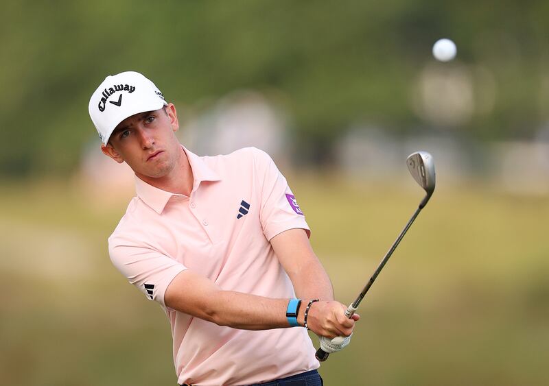 Tom McKibbin of Northern Ireland chips to the 12th green during the first round of the US Open. Photograph: Andrew Redington/Getty Images