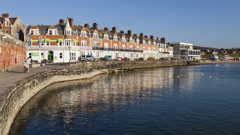 Promenade and sea wall at Swanage in the early morning sunshine. Photograph: Peter Noyce/Getty Images