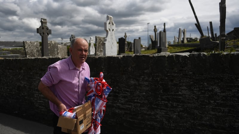 Doonbeg publican Tommy Tubridy with Stars and Stripes bunting. Photograph: Clodagh Kilcoyne/Reuters