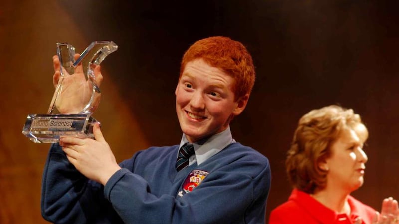 Patrick Collison (16) from Castletroy College, Limerick after being presented with the Esat BT Young Scientist of the Year 2005 title at the RDS. Photograph: Joe St Leger