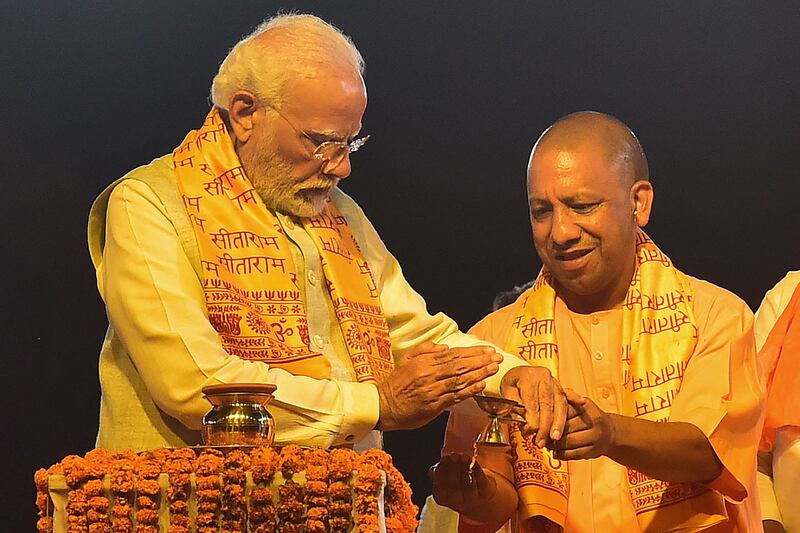 India's prime minister Narendra Modi and Yogi Adityanath, chief minister of Uttar Pradesh state. According to officials, more than 180 people have died in “encounters” with the police since Adityanath took over in 2017. Photograph: Sanjay Kanojia/Getty Images