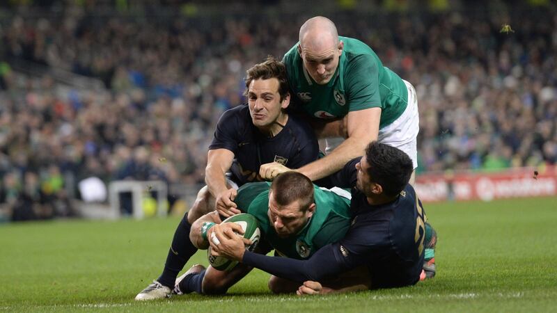 CJ Stander scores Ireland’s second try with support from Devin Toner. Photograph: Dara Mac Dónaill