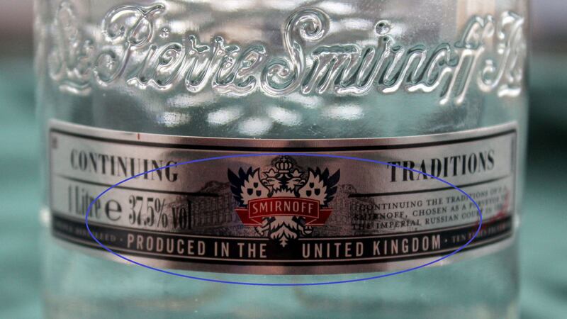 The lower front label on the 1L bottle of genuine Smirnoff.