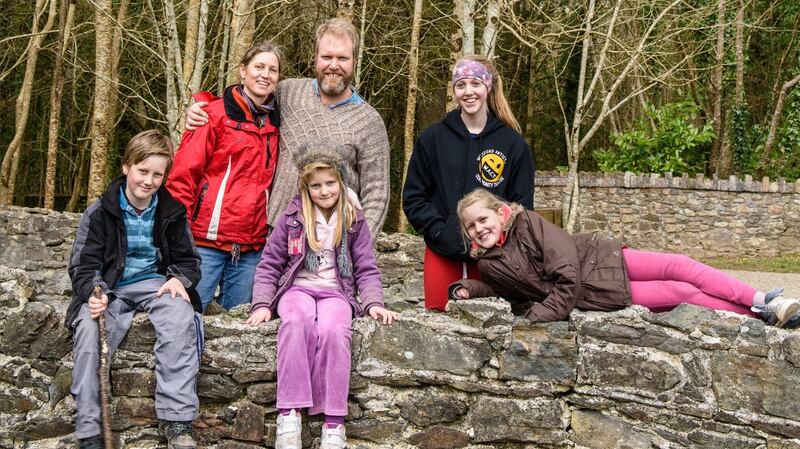 Liberty Henwick with her husband, Athol, and their children, from left: Nathaniel, Fia, Eva (standing) and Rebecca.