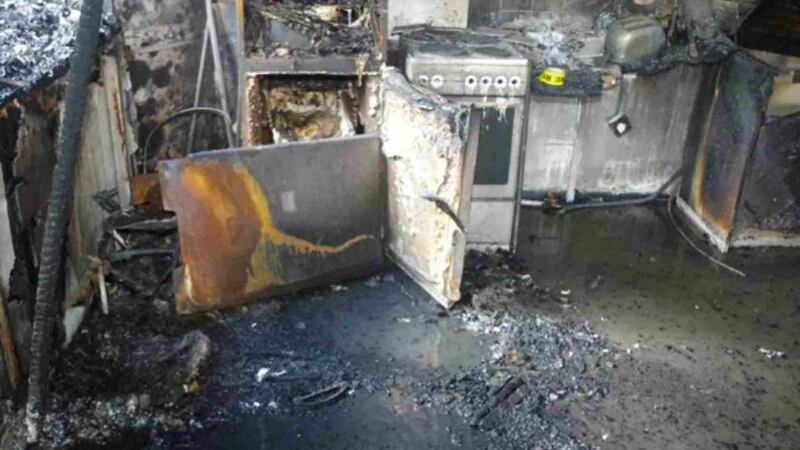 The fire damage to a tall fridge-freezer inside the kitchen of flat 16 of Grenfell Tower where the fire is believed to have started. Photograph: Grenfell Tower Inquiry/Getty Images