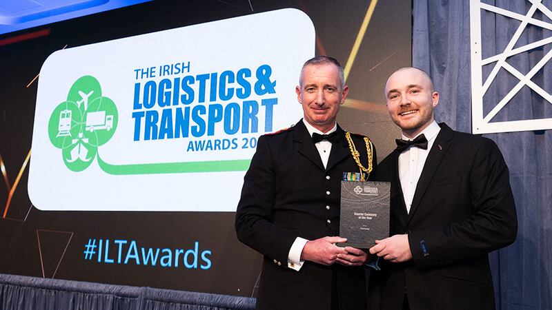 Gareth Prendergast, director of logistics of Irish Defence Forces presents the courier company of the year award to Thomas Hickey, Business River on behalf of Fastway