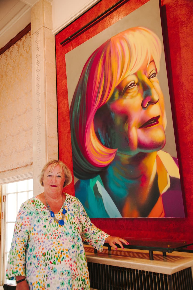 Peace Heroines exhibition: Co-founder of the Women’s Coalition Monica McWilliams stands beside her portrait by visual artist FRIZ. Photograph: Steve O'Connor/PA