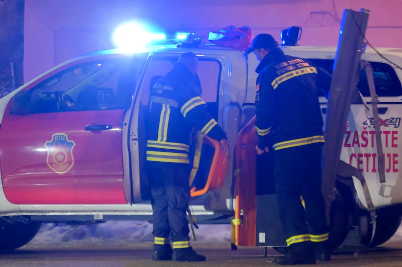 Emergency-services at the scene of the shooting in Cetinje. Photograph: Risto Bozovic/AP