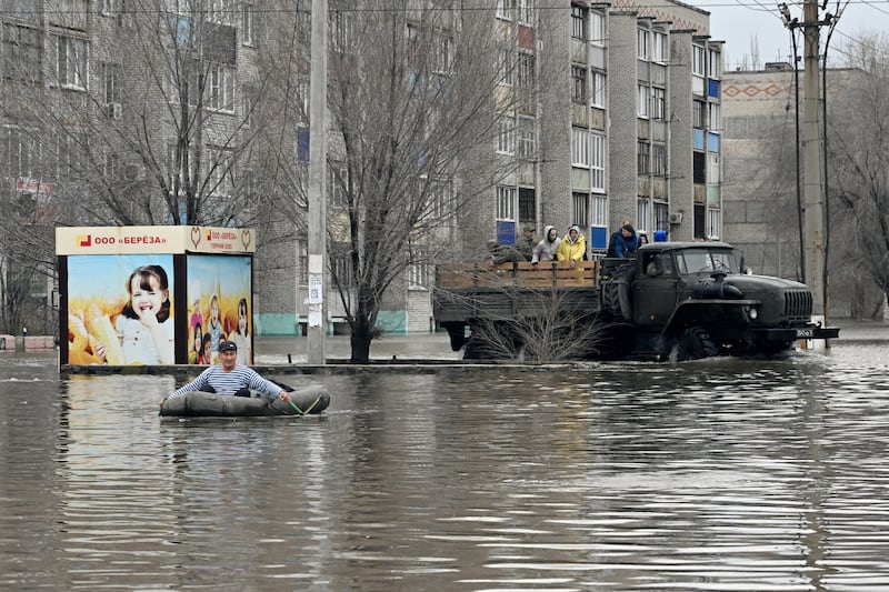 Rescuers evacuate residents from flooding in Orsk. Photograph: Anatoliy Zhdanov/Kommersant Photo/AFP/Russia Out via Getty