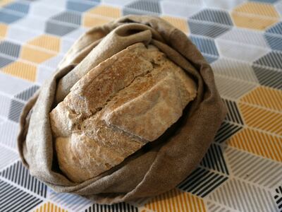 Zero-waster: Timi Nicholson uses a sustainable bag for her bread. Photograph: Laura Hutton