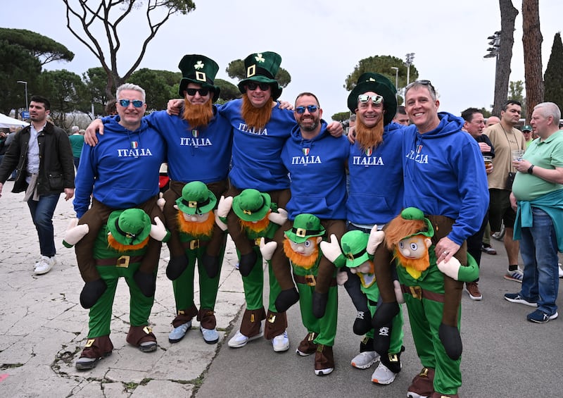 GIDDYUP for the week that's in it. Fans pose for a photo outside the stadium whilst wearing leprechaun fancy dress prior to the Guinness Six Nations game between Italy and Ireland at Stadio Olimpico. Photo: Mike Hewitt/Getty Images