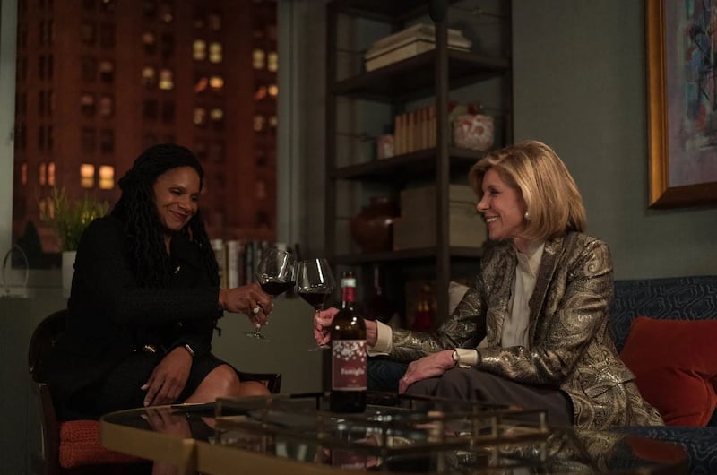 Christine Baranski as Diane Lockhart in The Good Fight, sharing a power-glass of red wine with a fellow attorney, played by Audra McDonald. Photograph: Paramount+