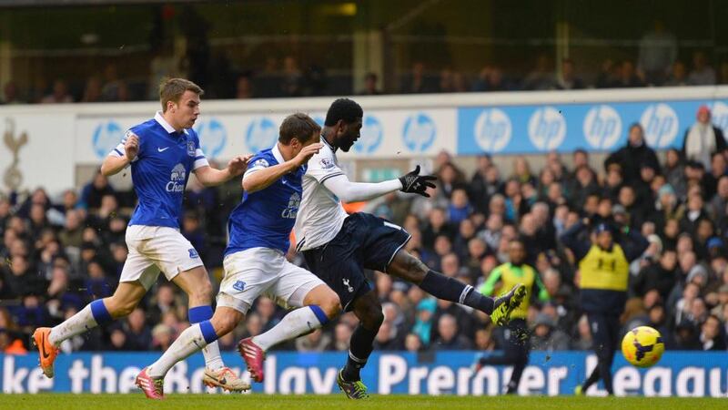 Tottenham Hotspur’s Emmanuel Adebayor scores his goal against Everton   at White Hart Lane . Photograph: Toby Melville/Reuters