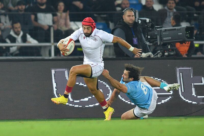 Akaki Tabutsadze of Georgia in action against Manuel Ardao of Uruguay. Photograph: Levan Verdzeuli/Getty