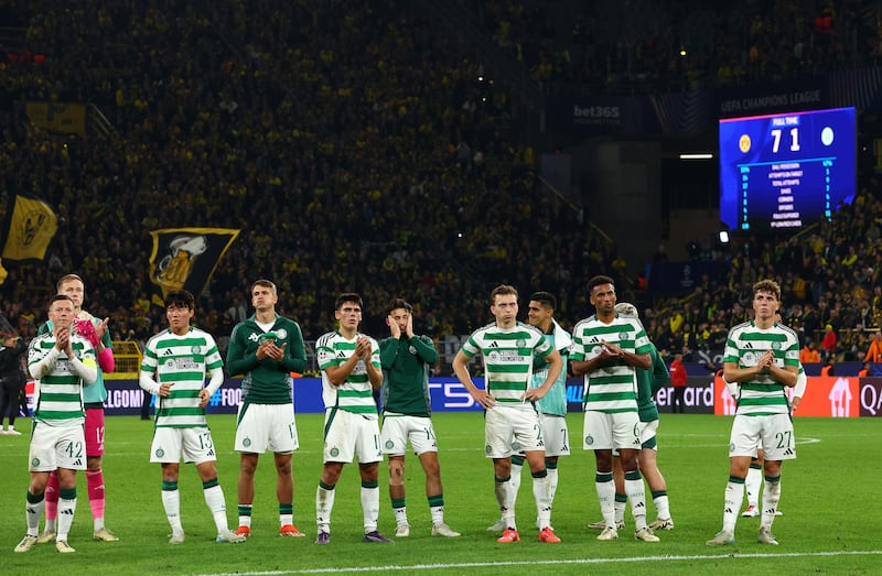 Celtic players acknowledges the fans after the 7-1 defeat away to Borussia Dortmund on October 1st at the BVB Stadion. Photograph: Dean Mouhtaropoulos/Getty Images