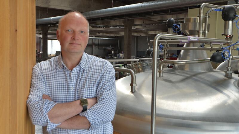 Peter Mosely, managing director of the Porterhouse Brewing Company at their brewery in Dublin. A far more recent addition to supermarket shelves  is a range of beers from the company. This time last year the beers – beloved among beer, stout and ale purists – were mainly available in the handful of bars owned by the company. Photograph: Alan Betson