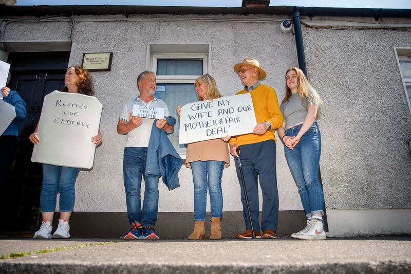 Toddy O’Sullivan, Roisin Ryan (Madeleine Horgan’s daughter), Eoghan Horgan (husband of Madeleine) and Sarah Stanley at the protest on Monday at Tánaiste Micheál Martin's offices. Photograph: Daragh Mc Sweeney/Provision