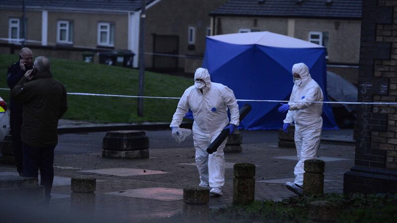 A Garda forensic unit at the scene at Bridgeview halting site near Cloverhill Road  in west Dublin. Photograph: Cyril Byrne/The Irish Times