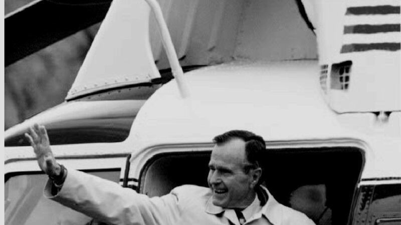 A file photo from 1992 showing the then  US president George Bush waving to well-wishers as he boards  Marine One for a weekend at the presidential retreat in Camp David. Photograph: AFP