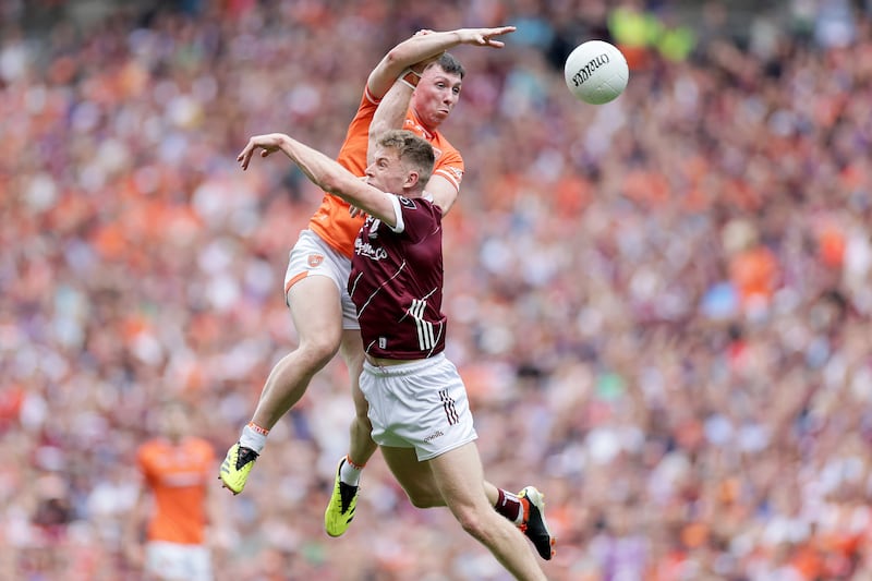 Armagh's Oisin Conaty and Galways's Dylan McHugh. Photograph: Laszlo Geczo/Inpho