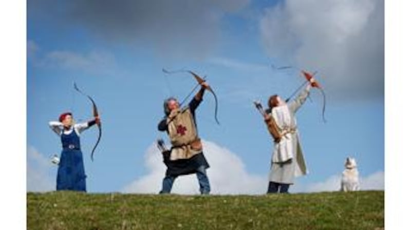 Traditional field archers Emily Roche, John Bohannon and Annie Trueman