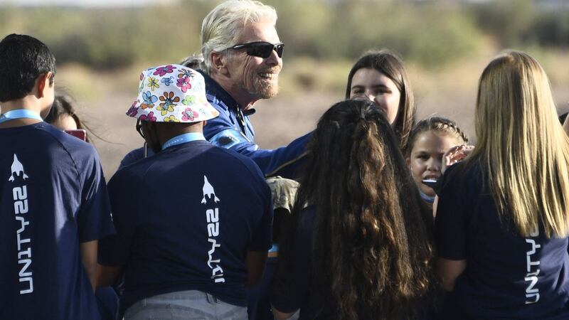 Richard Branson is welcomed as he arrives at Spaceport America, New Mexico,   hours before travel to the cosmos aboard a Virgin Galactic space vessel.  Photograph: Patrick T Fallon/AFP via Getty Images