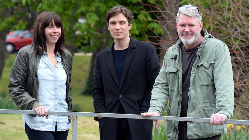 Director Pat Kiernan  (right) with Disco Pigs cast members Cillian Murphy  and Eileen Walsh:  “We have no idea how many people will actually want to come and share a space in the same way that we once did.” Photograph: Eric Luke