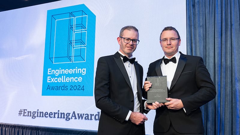 Niall Hanley, awards judge, presents the software and electrical engineering project of the year award to Colm Smyth, Cliniva