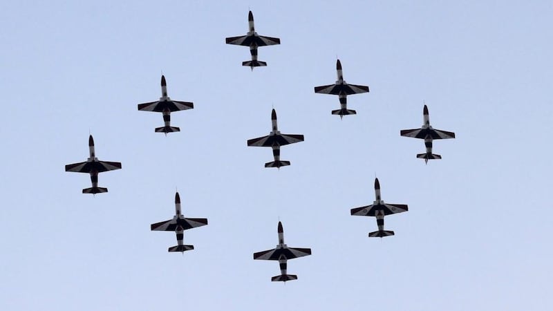 Egyptian military jets flew in formation over Tahrir square as the head of Egypt’s constitution court Adli Mansour was sworn in as the interim head of state.  Photograph: Mohamed Abd El Ghany/Reuters