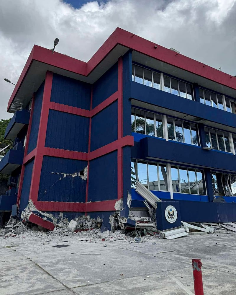 A damaged building in Port Vila, Vanuatu, as rescue efforts continued (Tim Cutler via AP)