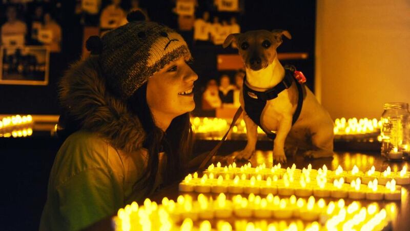 Tara Monaghan from Tallaght with her dog Lucy at the Pieta House Darkness into Light event. Photograph: Sasko Lazarov/Photocall Ireland