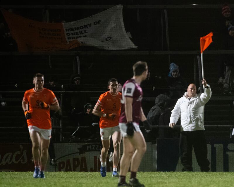 Galway's Cillian Ó Curraoin scores a two-pointer as the umpire raises an orange flag. Photograph: Evan Logan/Inpho  