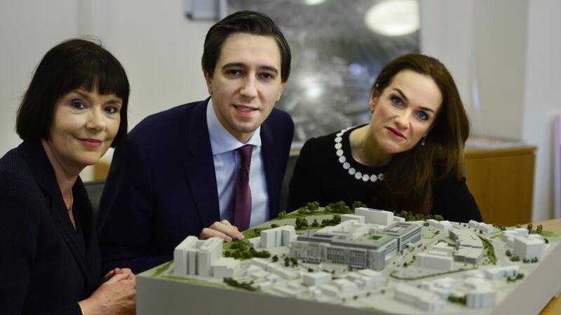 National Maternity Hospital chief operations officer Kay Connolly, Minister for Health Simon Harris and NMH master Rhona Mahony with a model of the planned new national maternity hospital. Photograph: Cyril Byrne