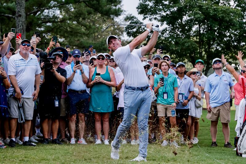 Rory McIlroy of Northern Ireland hits from the rough of the first fairway during the final round of the 2023 Tour Championship. Photograph: EPA