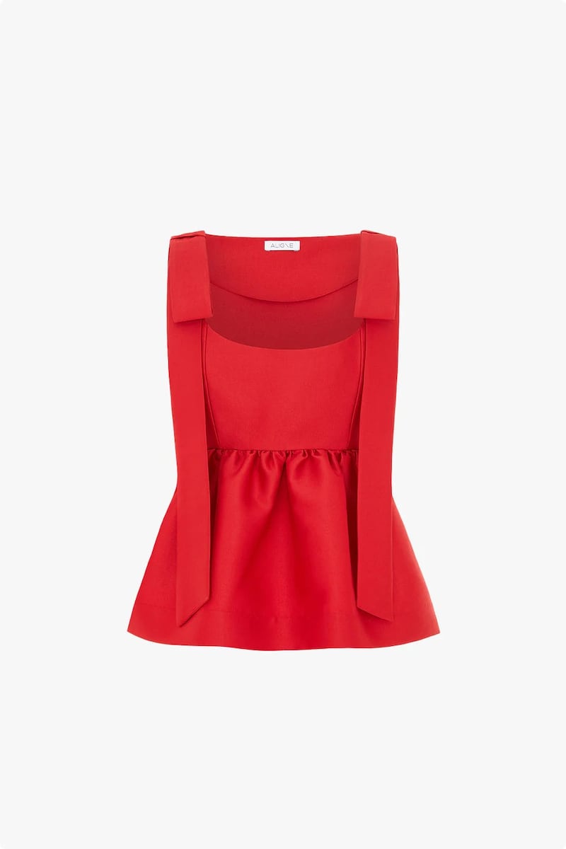 Bow satin peplum top, €135, Aligne