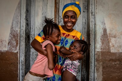 Kadiatu Bangura, with daughters Adama and Mariama, in Port Loko.