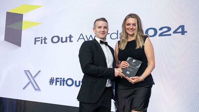 Enda Gallagher, commercial director of CRM Interior Fit-Outs, presents the fit out designer of the year award to Marie Smyckova, O'Donnell O'Neill Design