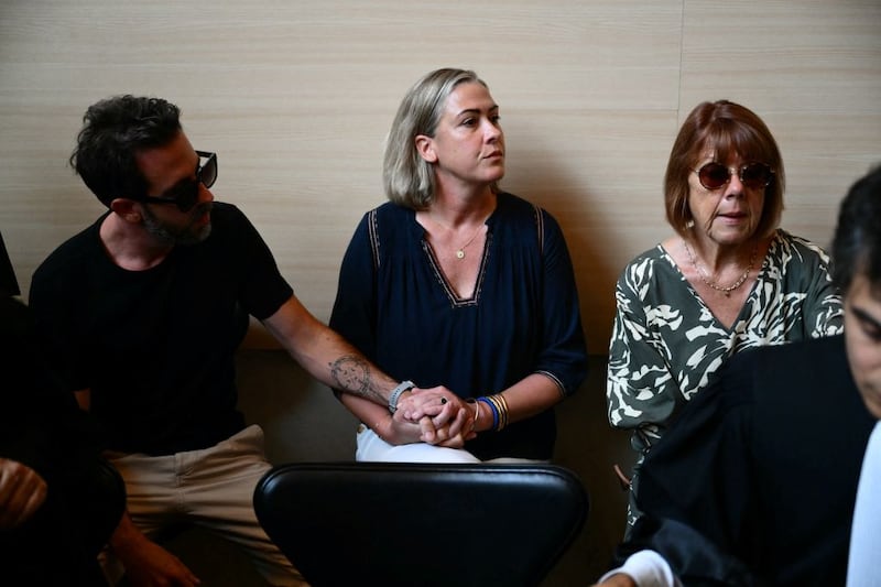 Gisele Pelicot beside her daughter Caroline Darian and her son at the courthouse during the trial. Photograph: Christophe Simon