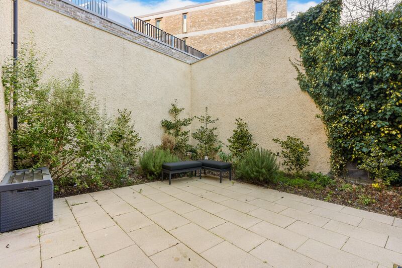 Private, west-facing courtyard garden to rear