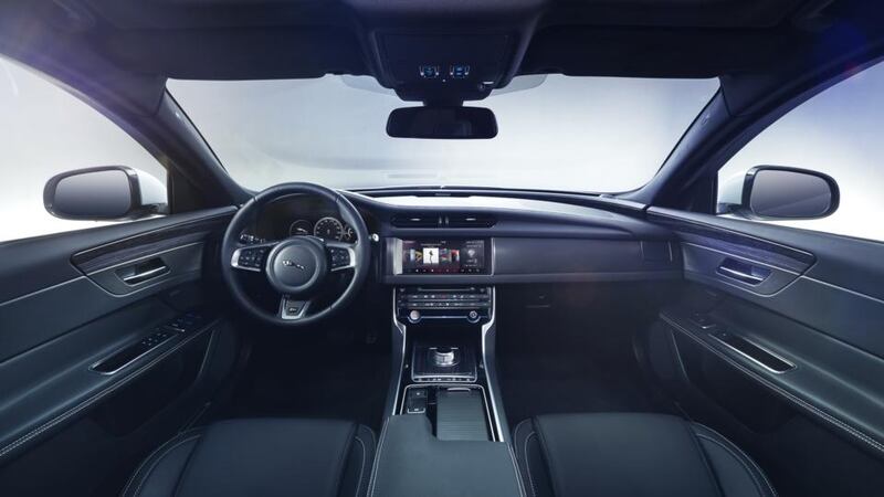 New XF’s cabin mixes cues from the current car and the new XE.