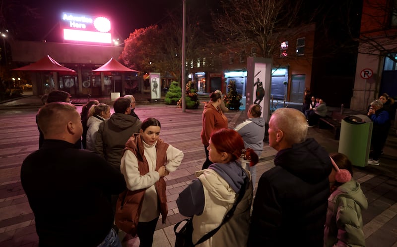 People take part in a vigil for Kyran Durnin in Market Square, Dundalk, on Monday evening. Photograph: Liam McBurney/PA Wire 