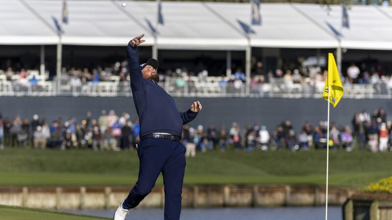 Shane Lowry  tosses his ball into the crowd after making a hole-in-one on the 17th hole during the third round of The Players Championship in 2022. Photograph: David Rosenblum/Icon Sportswire via Getty Images