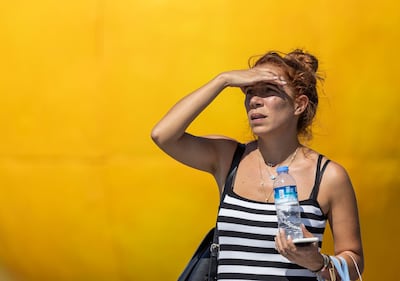 A woman protects her face from the sun in Istanbul, Turkey, where authorities this week warned that citizens over the age of 65 and those with chronic diseases should not go out unless necessary. Photograph: Erdem Sahin/EPA-EFE/Shutterstock