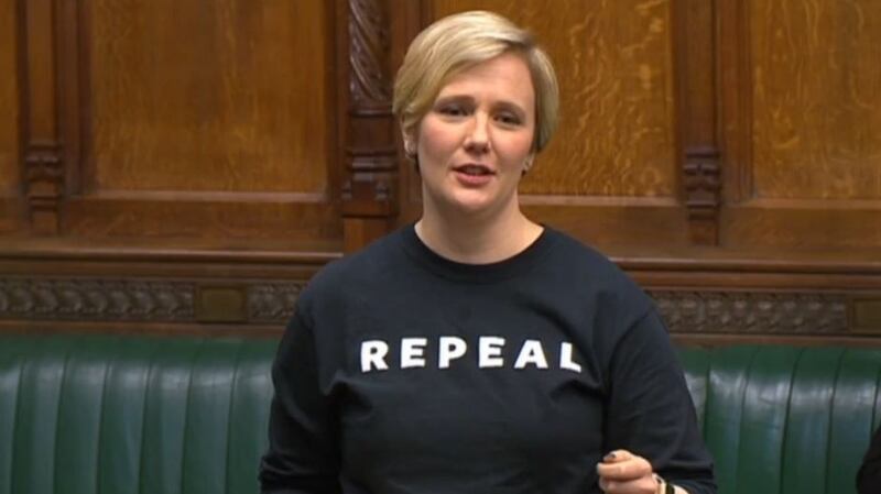 Stella Creasy wearing a Repeal jumper in the Houses of Parliament, London.