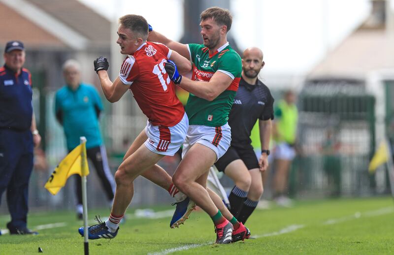 Cork's Tommy Walsh in action against Mayo's Aidan O'Shea at TUS Gaelic Grounds, Limerick. Photograph: Evan Treacy/Inpho