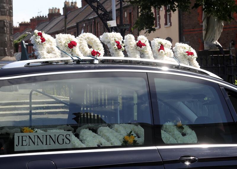 A floral tribute adorns the hearse outside the Church of the Holy Family. Photograph: Colin Keegan/Collins Dublin