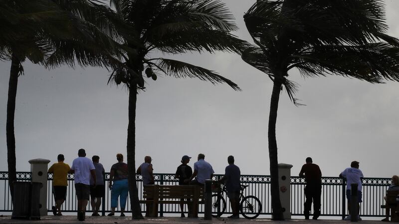 Residents watch as watch the heavy surf during a mandatory evacuation as Hurricane Dorian inches closer to the US on Monday.  Photograph: Mark Wilson/Getty Images