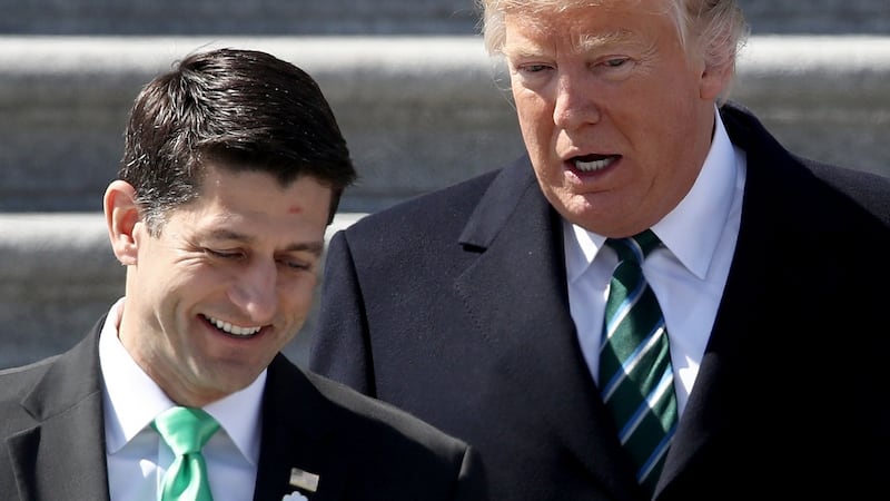 President Donald Trump  with speaker of the House of Representatives  Paul Ryan  following a St Patrick’s Day luncheon in Washington. Photograph:  Win McNamee/Getty Images