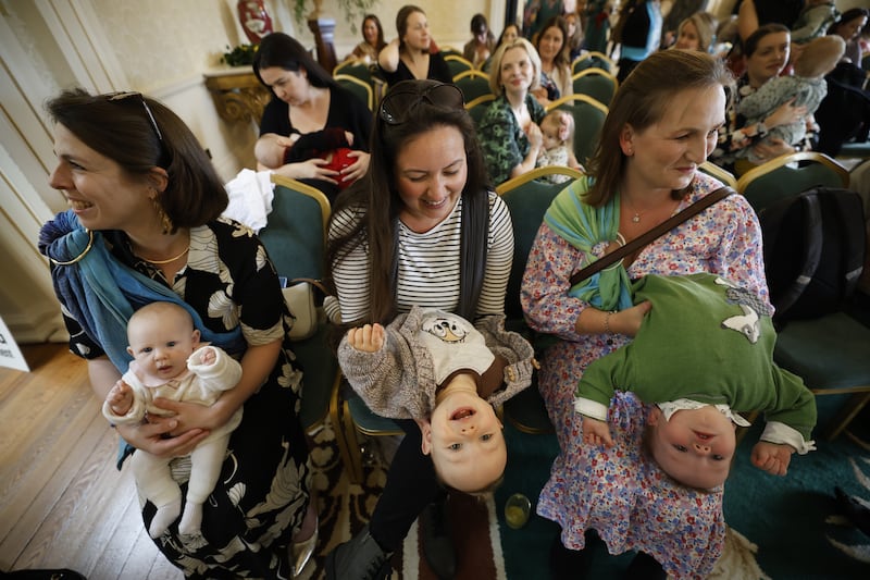 Maddie and Felicity Comerford from Wexford with Aimee and Bobby O’Brien from Wexford and Amy Carney with baby Iarlaith from Co. Clare attended a ‘Latching On’ morning in Áras an Uachtaráin, as part of National Breastfeeding Week hosted Sabina Higgins. Photograph Nick Bradshaw / The Irish Times